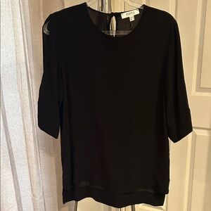 Elegant Black‎ Women's Blouse with split shoulder.